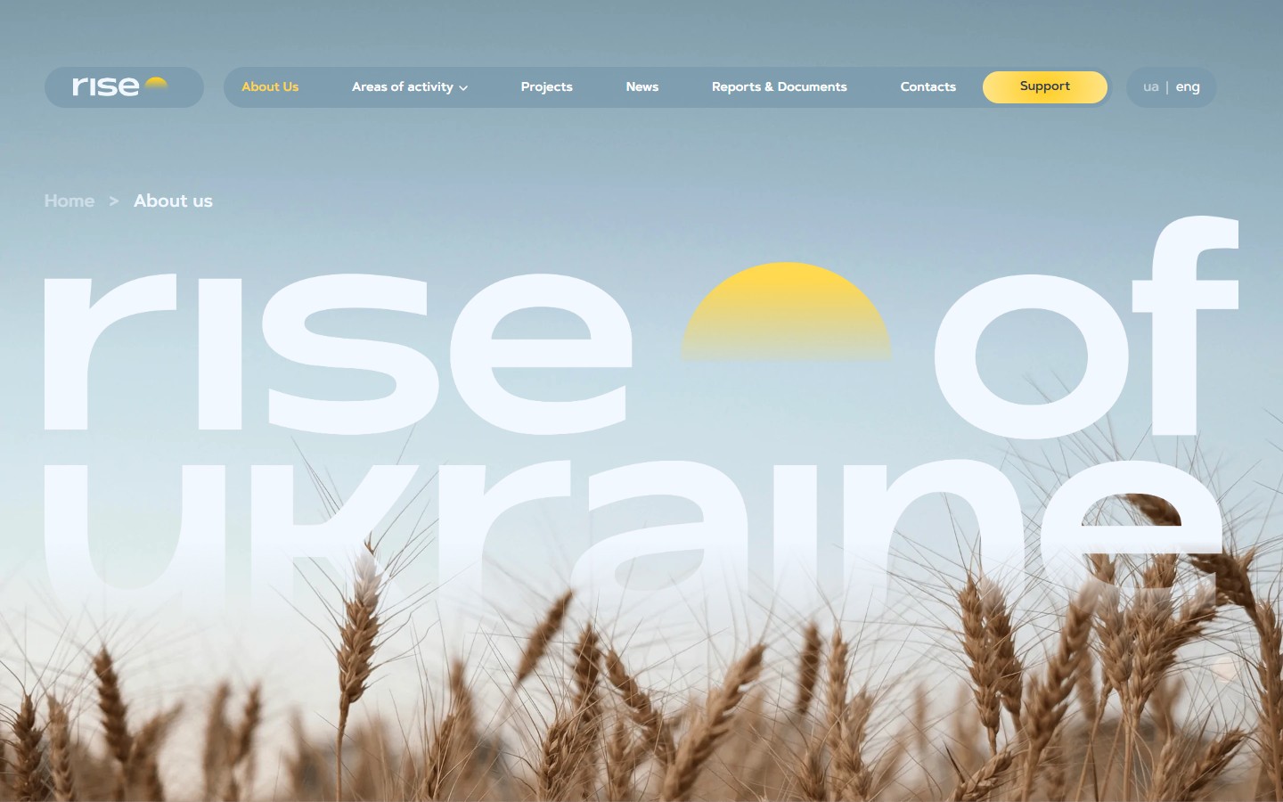 Hero About — пшеничне поле і word-art «rise of UKRAINE» з sun-arc